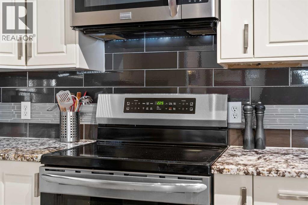 Single Family House Bungalow for Sale in  Richelieu Court SW Lincoln Park Calgary 