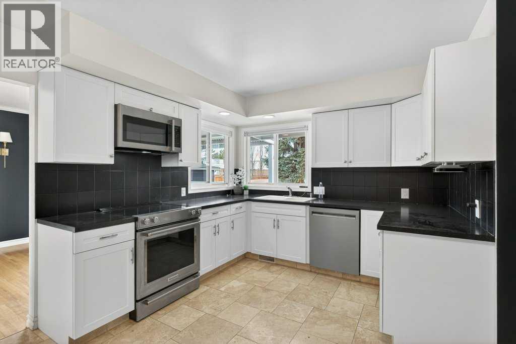 Single Family House Bungalow for Sale in  Woodland Crescent SE Willow Park Calgary 