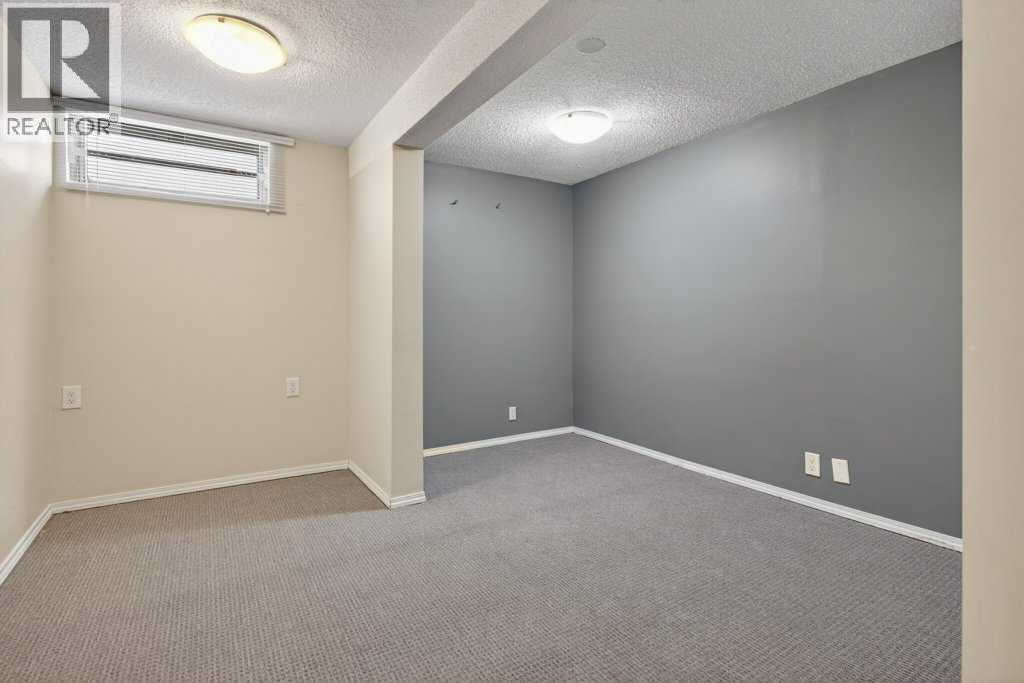 Single Family House Bungalow for Sale in  Woodland Crescent SE Willow Park Calgary 