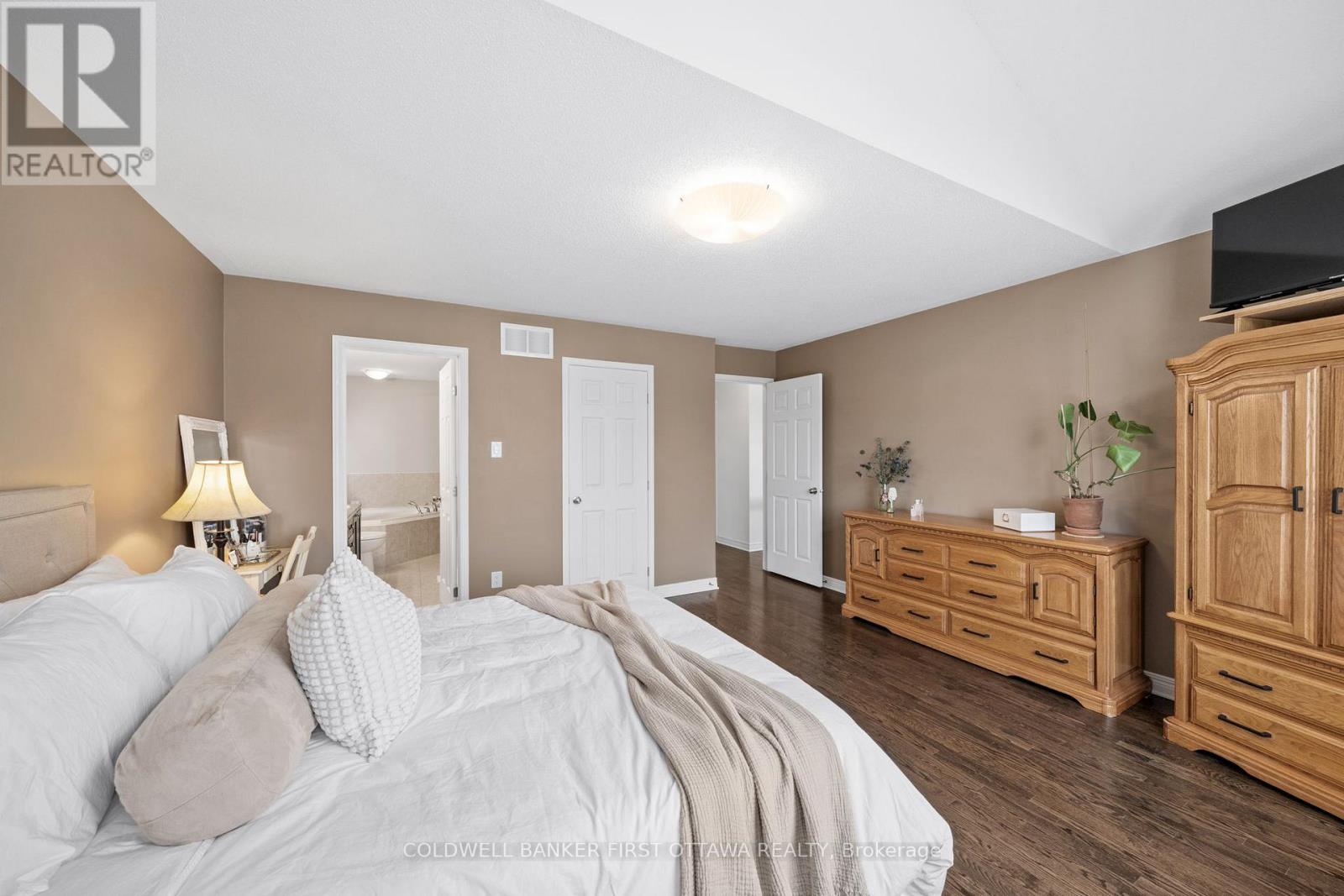 Walk in closet & 5 pc en suite bath.