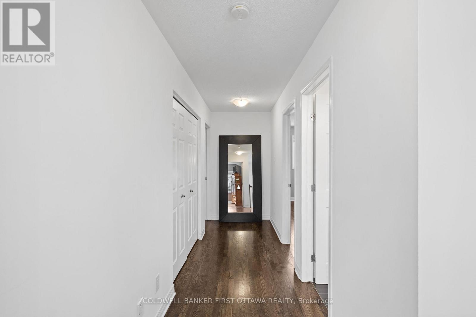 Hallway leading to other bedrooms.