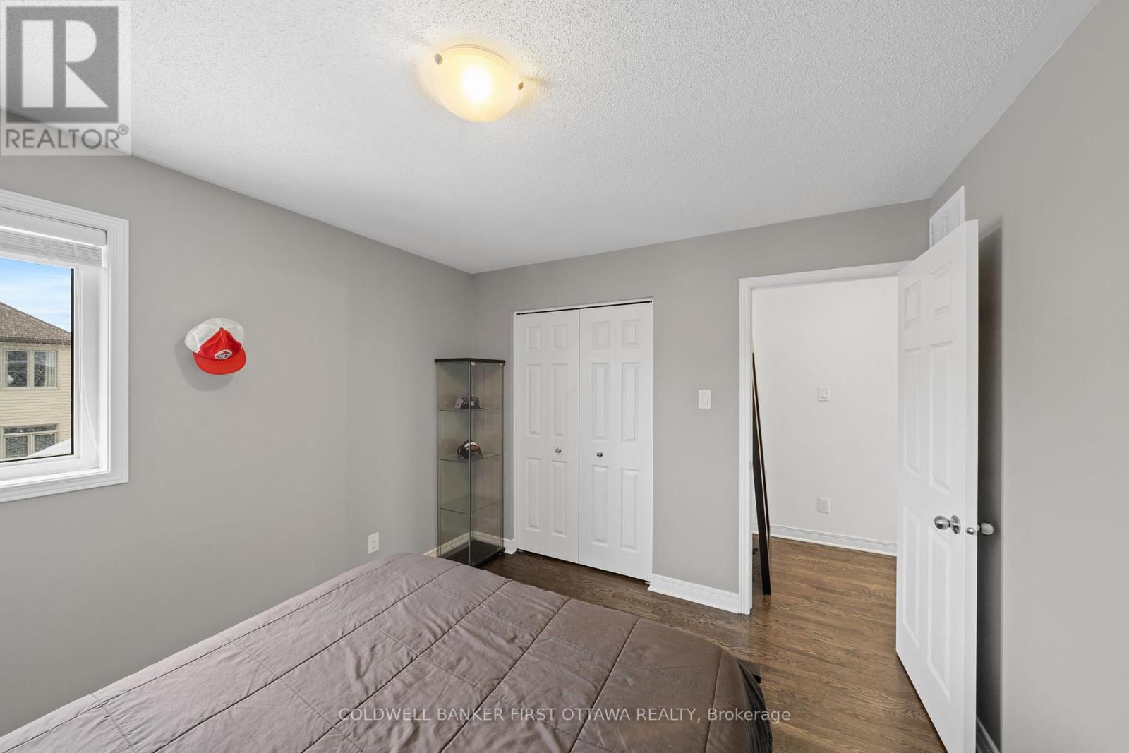 Dbl door closet & fixture above.