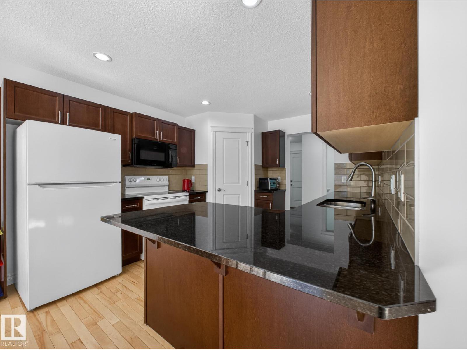 718 ADAMS WY SW - 16