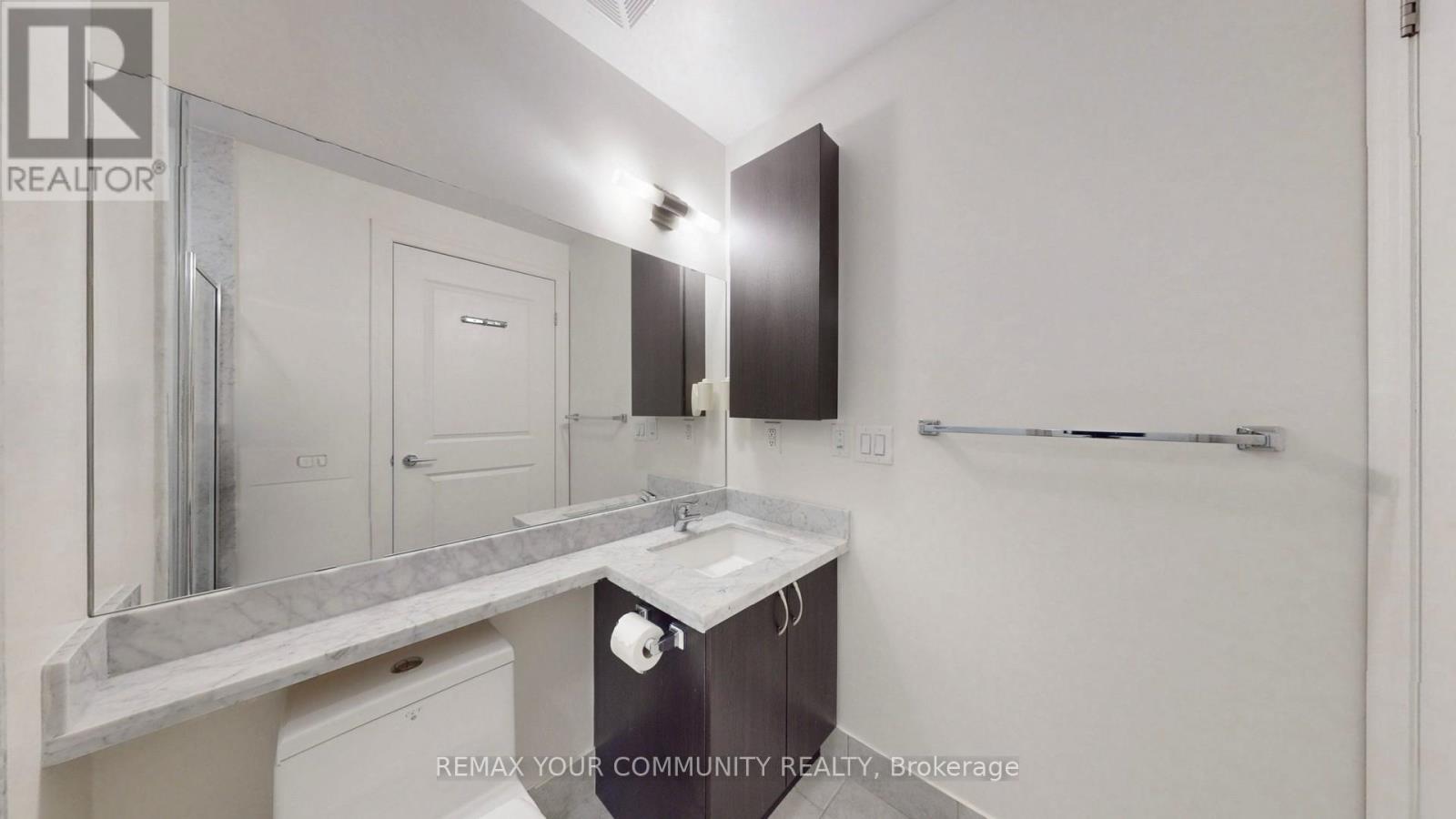 #703 21 UPPER DUKE CRESCENT - 40