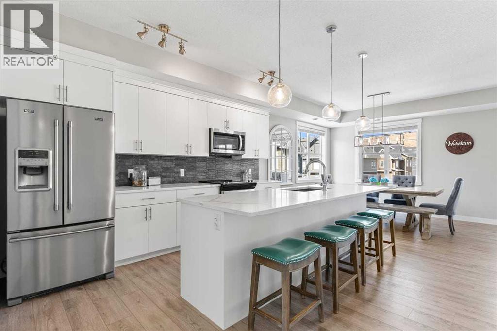 Single Family House Bungalow for Sale in  Cranbrook Walk SE Cranston Calgary 