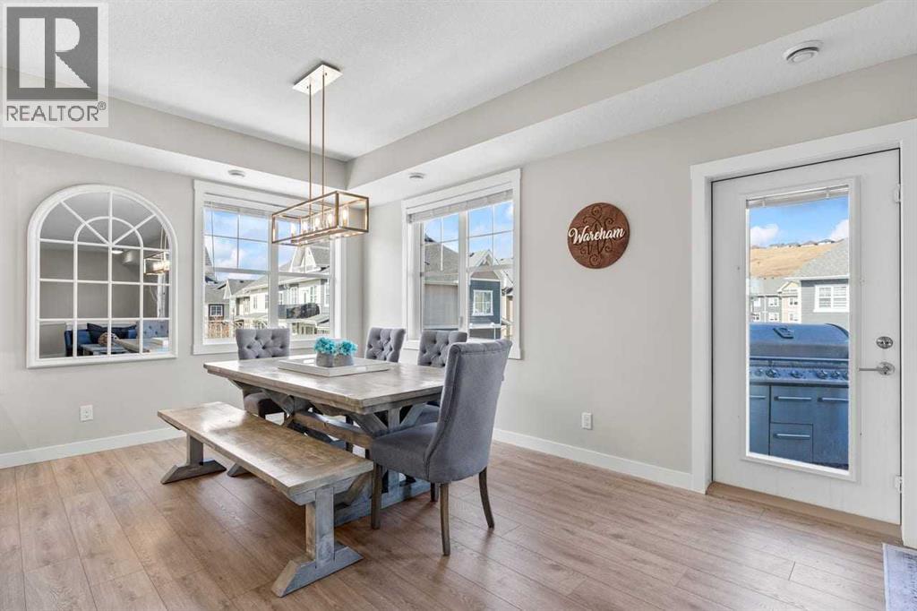 Single Family House Bungalow for Sale in  Cranbrook Walk SE Cranston Calgary 