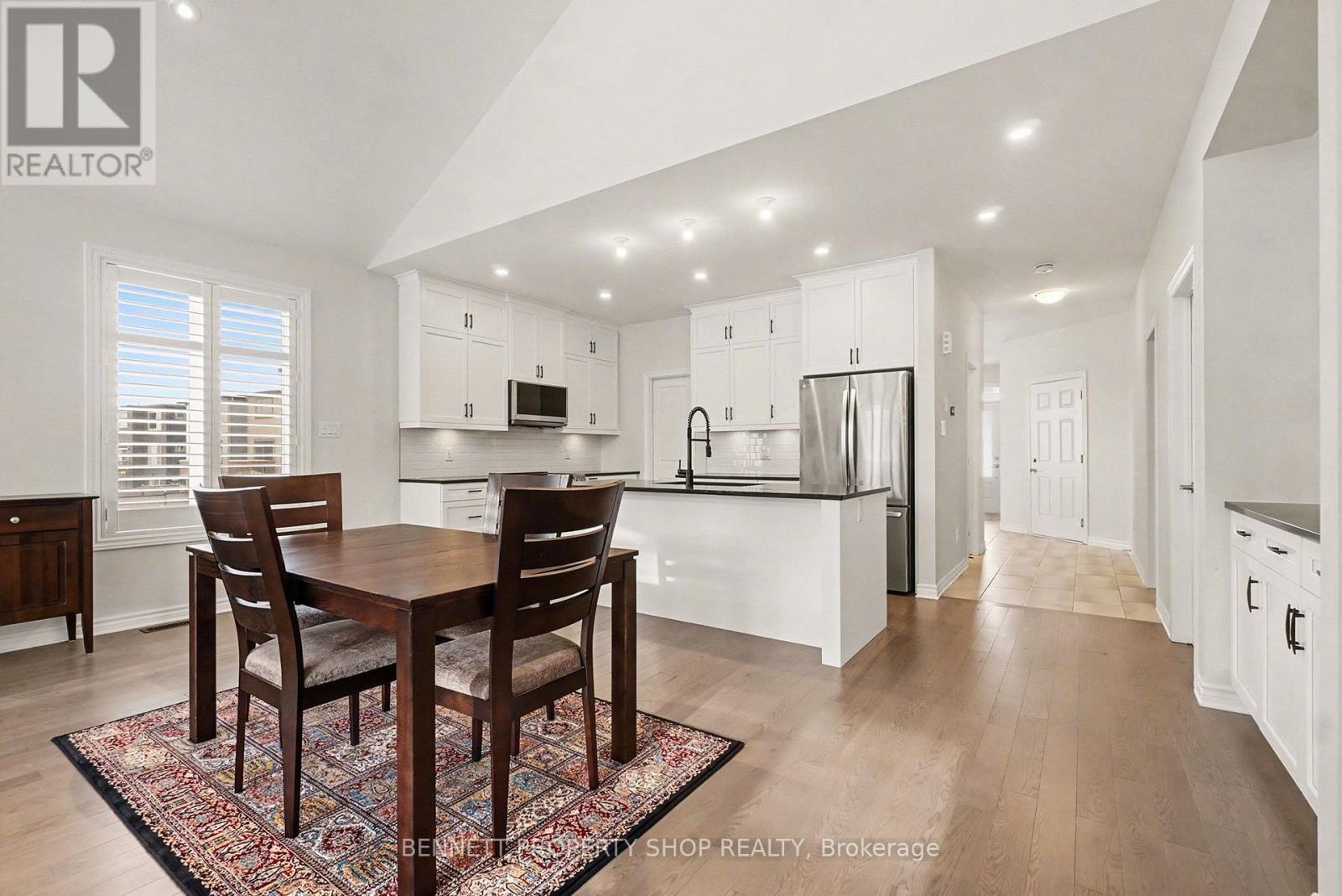 Crisp White Upgraded Cabinets to Ceiling