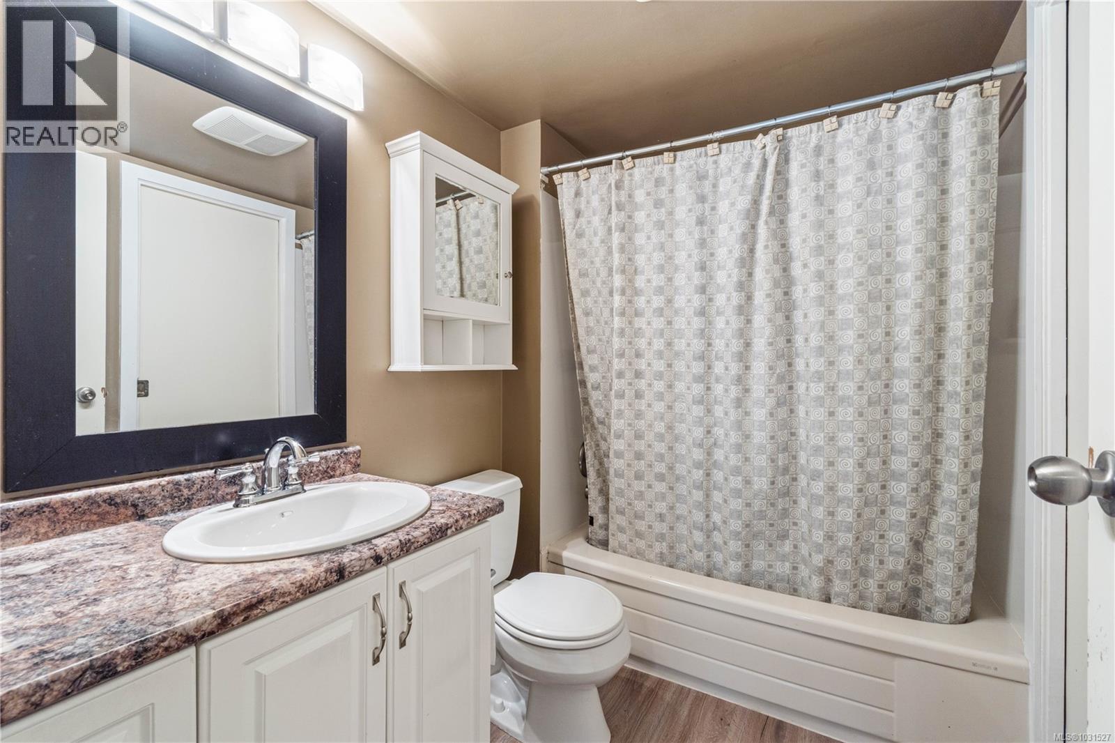 #418 2562 DEPARTURE BAY RD - 14