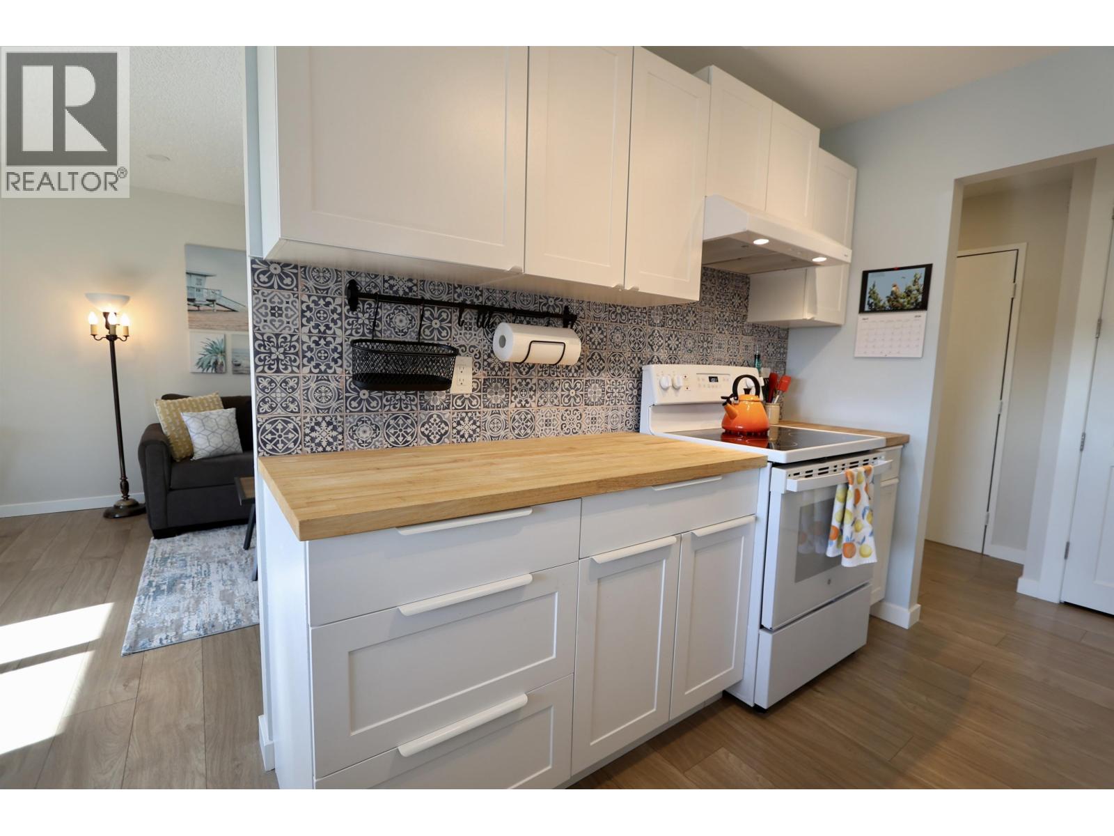 #202 4288 15TH AVENUE - 5