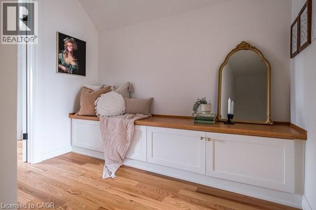 The staircase leading to the second floor has been fully rebuilt with added structural supports (permitted and done by licensed professionals) to reinforce the upper level, and features carpet install