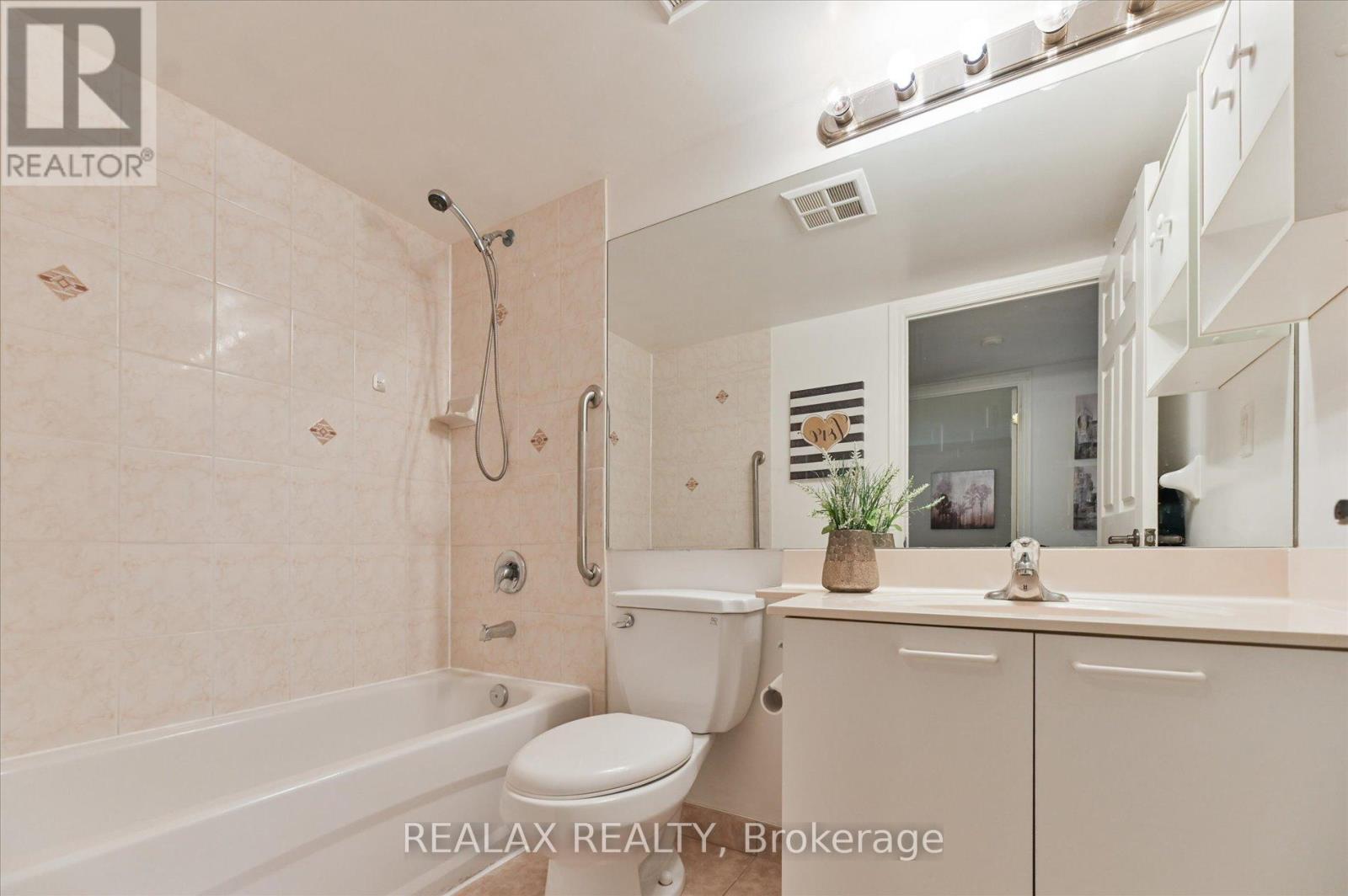 #302 130 POND DRIVE - 25
