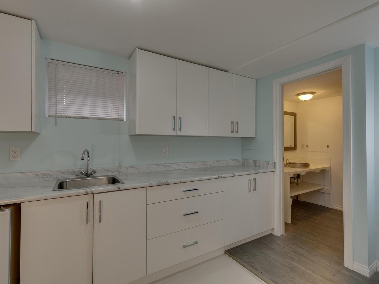 7650 TAULBUT STREET — photo 30
