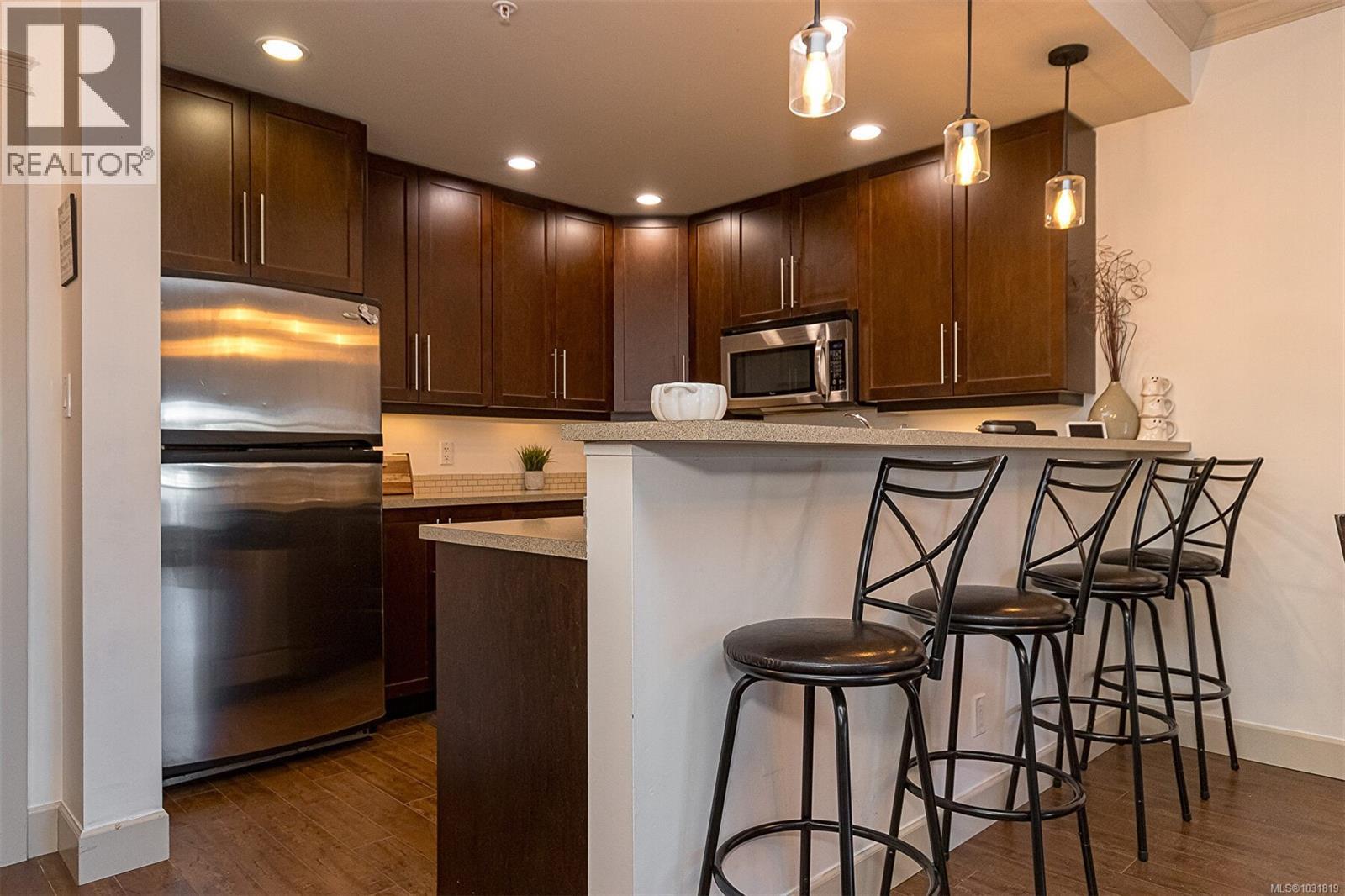 #203 2881 PEATT RD - 13