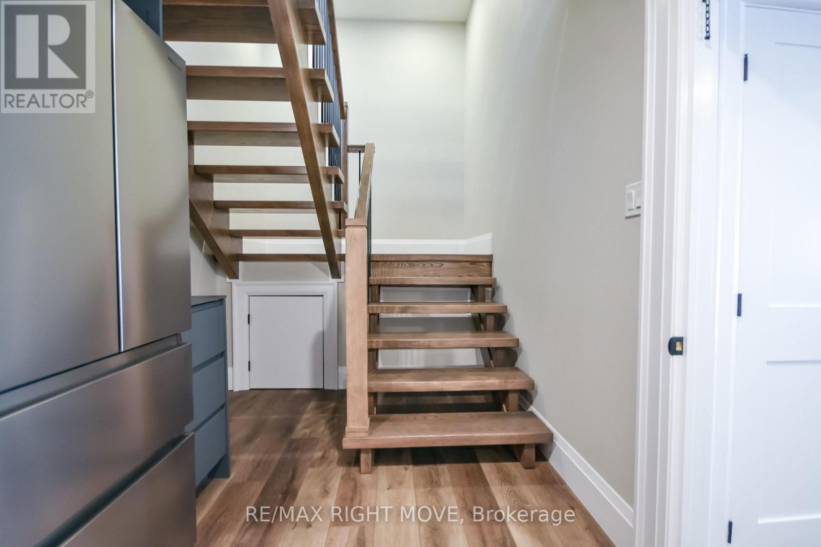 Beautiful staircase continues to lower level