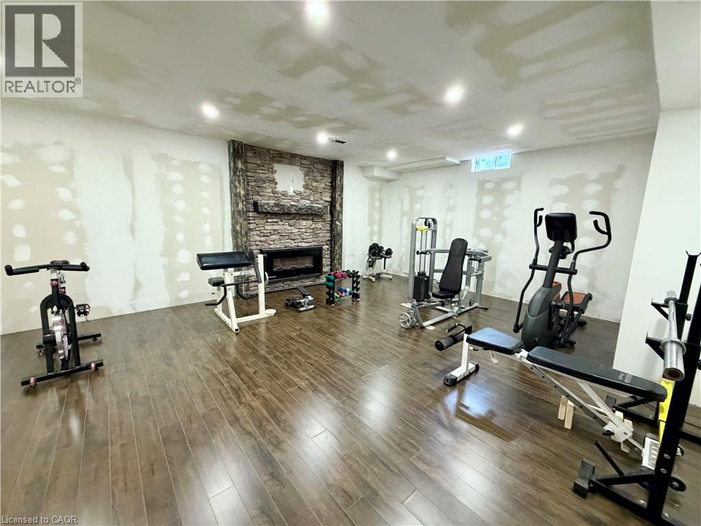 9 ft ceilings in basement. Fitness room with stone fireplace