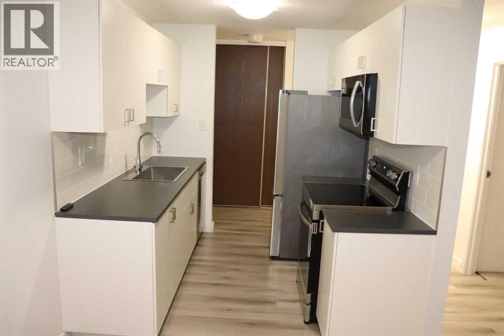 #201A 5611 10 AVENUE - 18