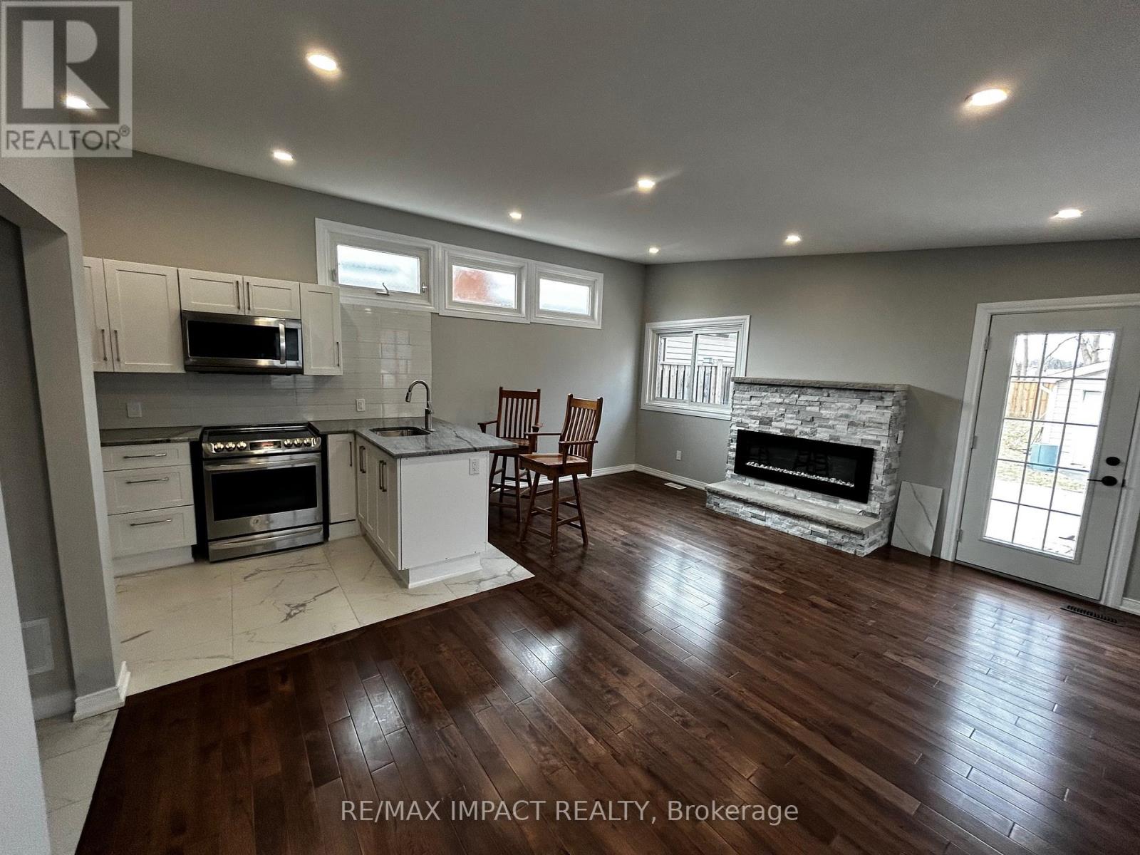 New Addition Kitchen overlooking the Living Room