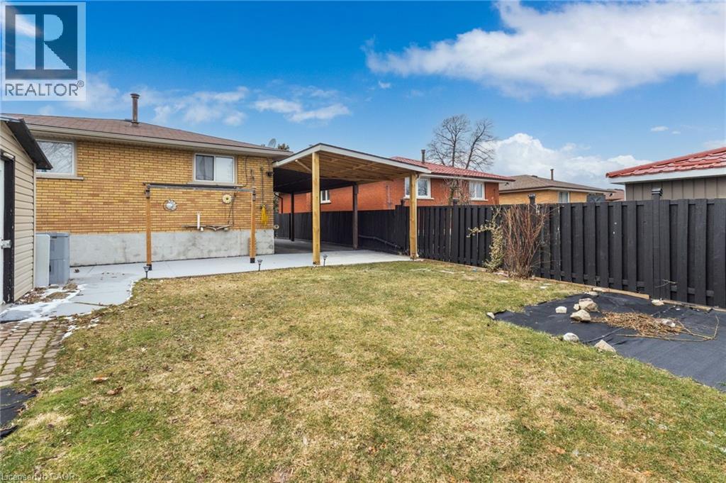 Fenced backyard featuring a patio area