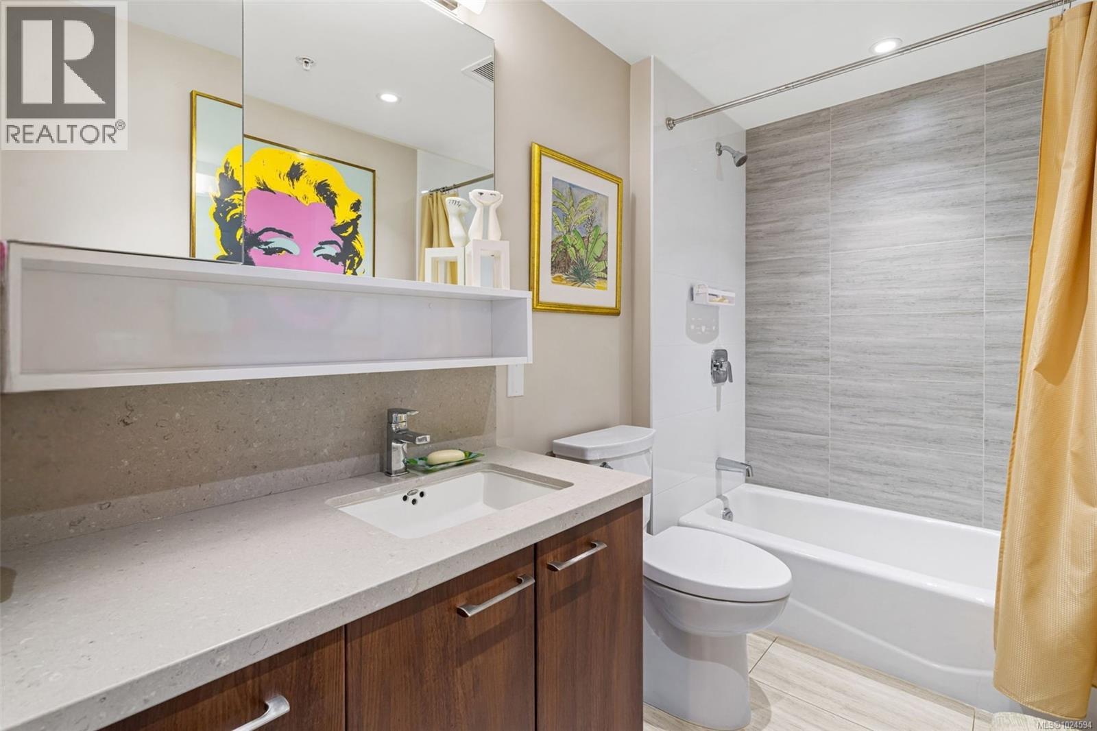 Second full bathroom featuring shower / bathtub combination.