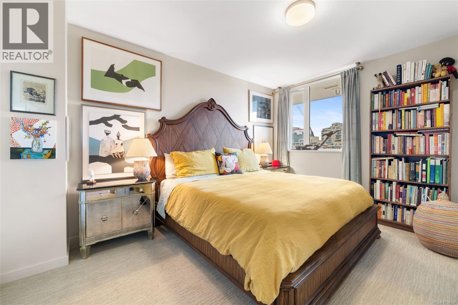 Primary bedroom with cityviews.