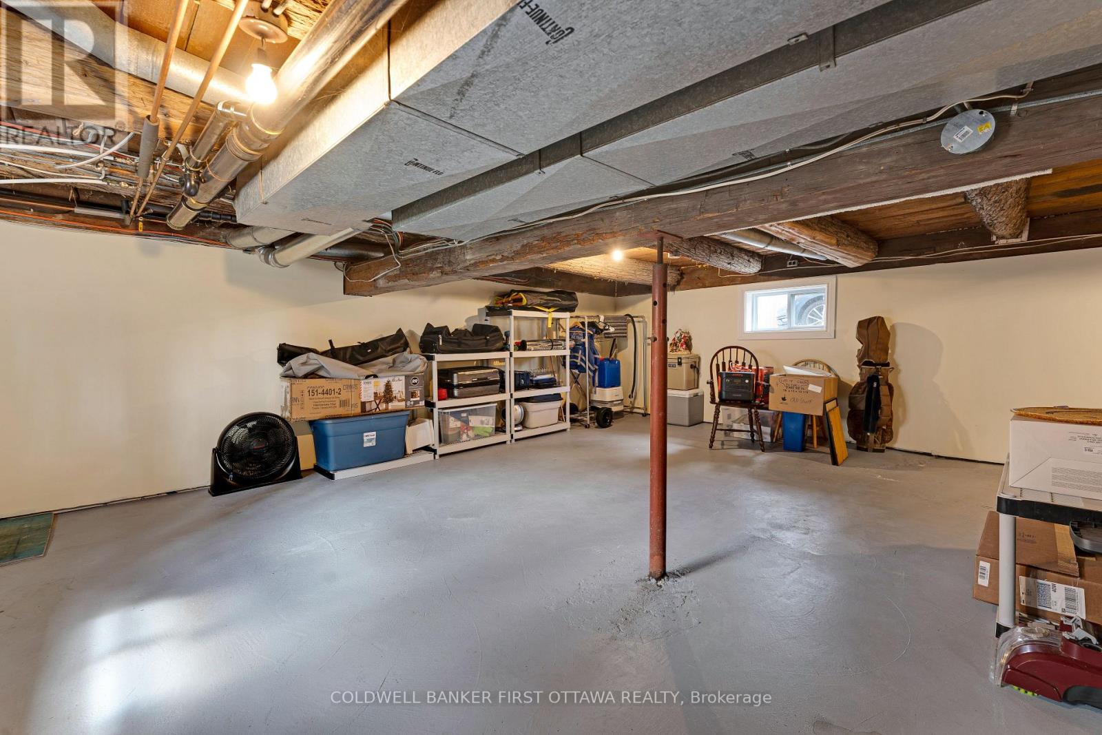 Basement storage area with concrete floor