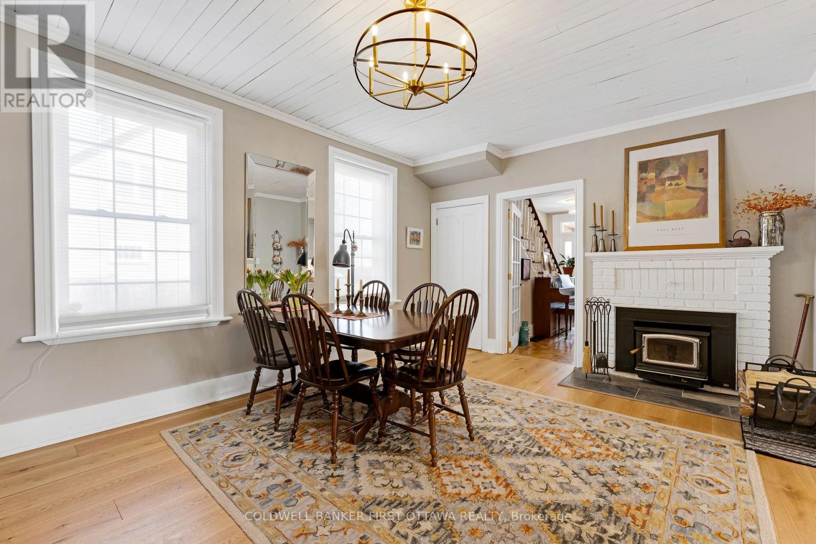 Dining room fireplace with wood-burning insert