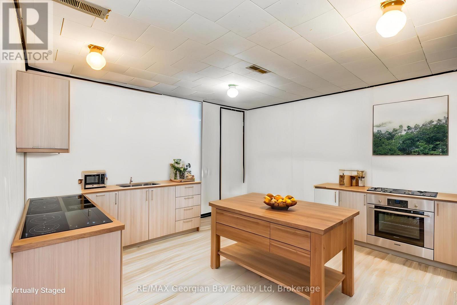 Virtually staged - potential kitchen in basement
