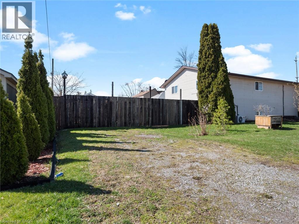 View of fenced backyard