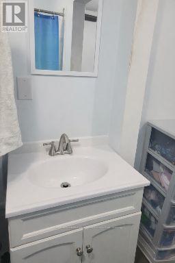 Combined laundry and bathroom