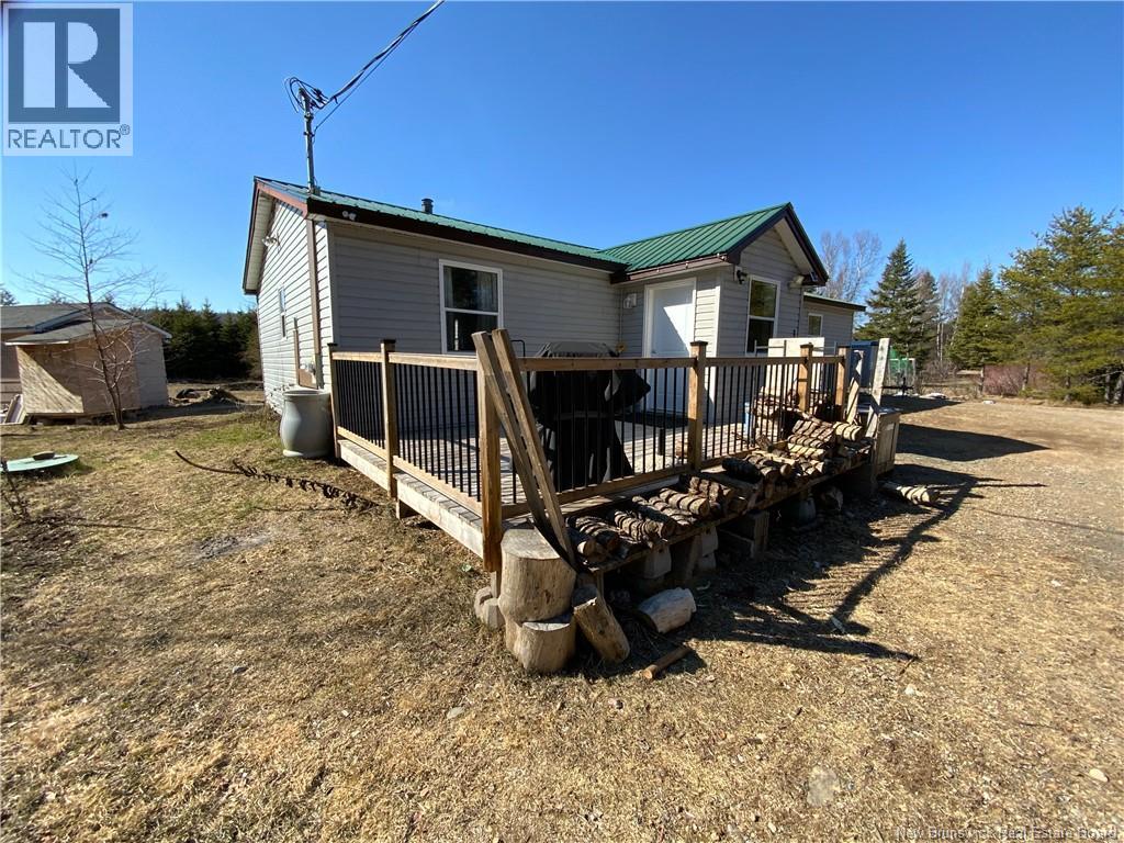 Deck with attached Mudroom.