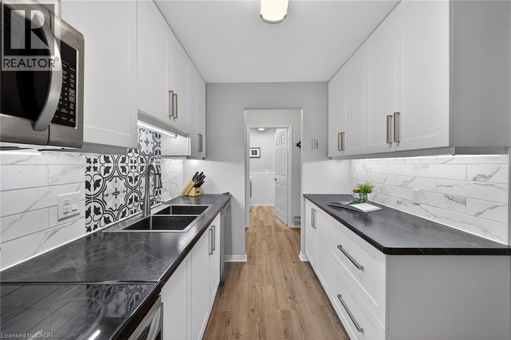 6 NIAGARA Street Unit# 208, Grimsby, Ontario, L3M5A4 — Photo 6