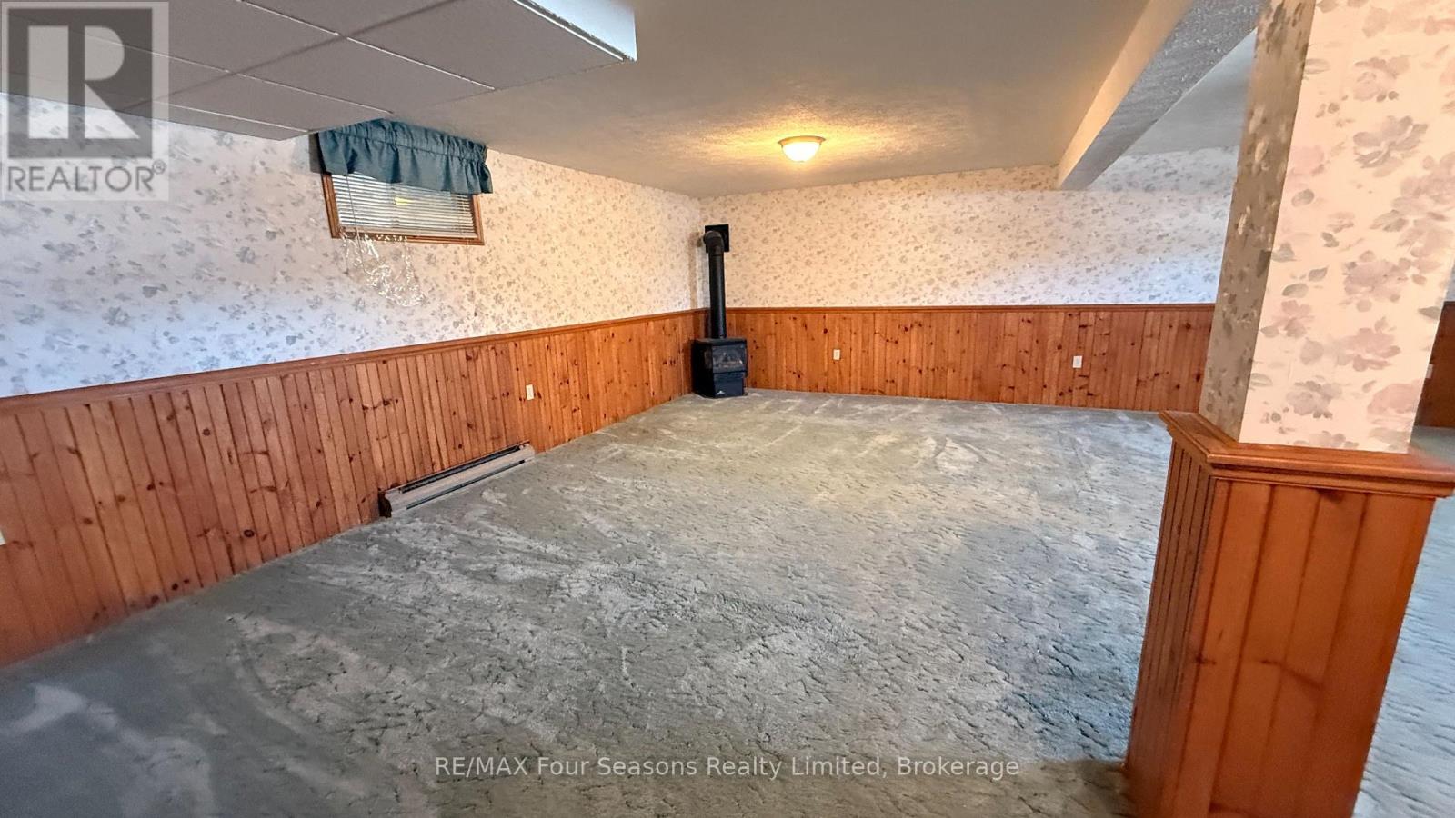 Large rec room with gas fireplace