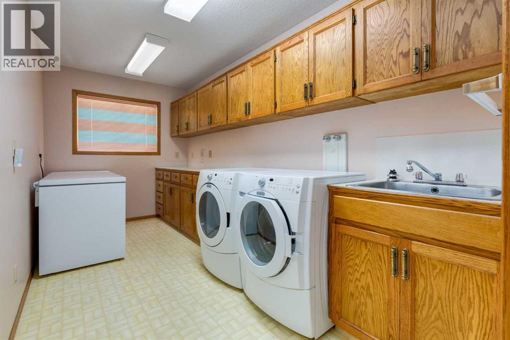 Single Family House Bungalow for Sale in  Hawkview Manor Circle NW Hawkwood Calgary 