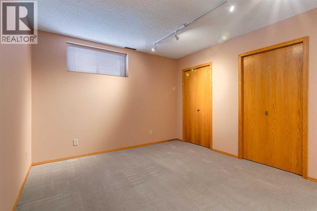 Single Family House Bungalow for Sale in  Hawkview Manor Circle NW Hawkwood Calgary 