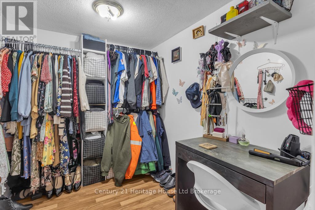 Walk in closet/dressing room in basement