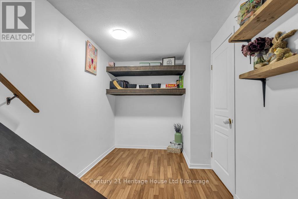 landing at bottom of basement stairs