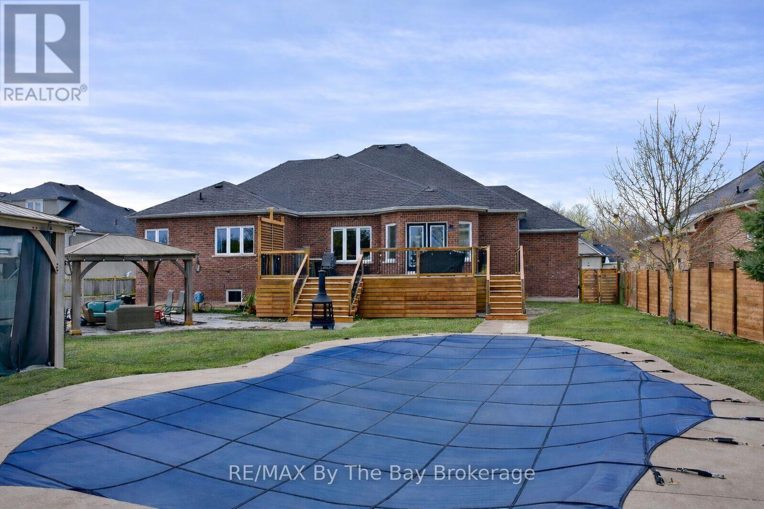 In-Ground Pool and Fenced Large Backyard
