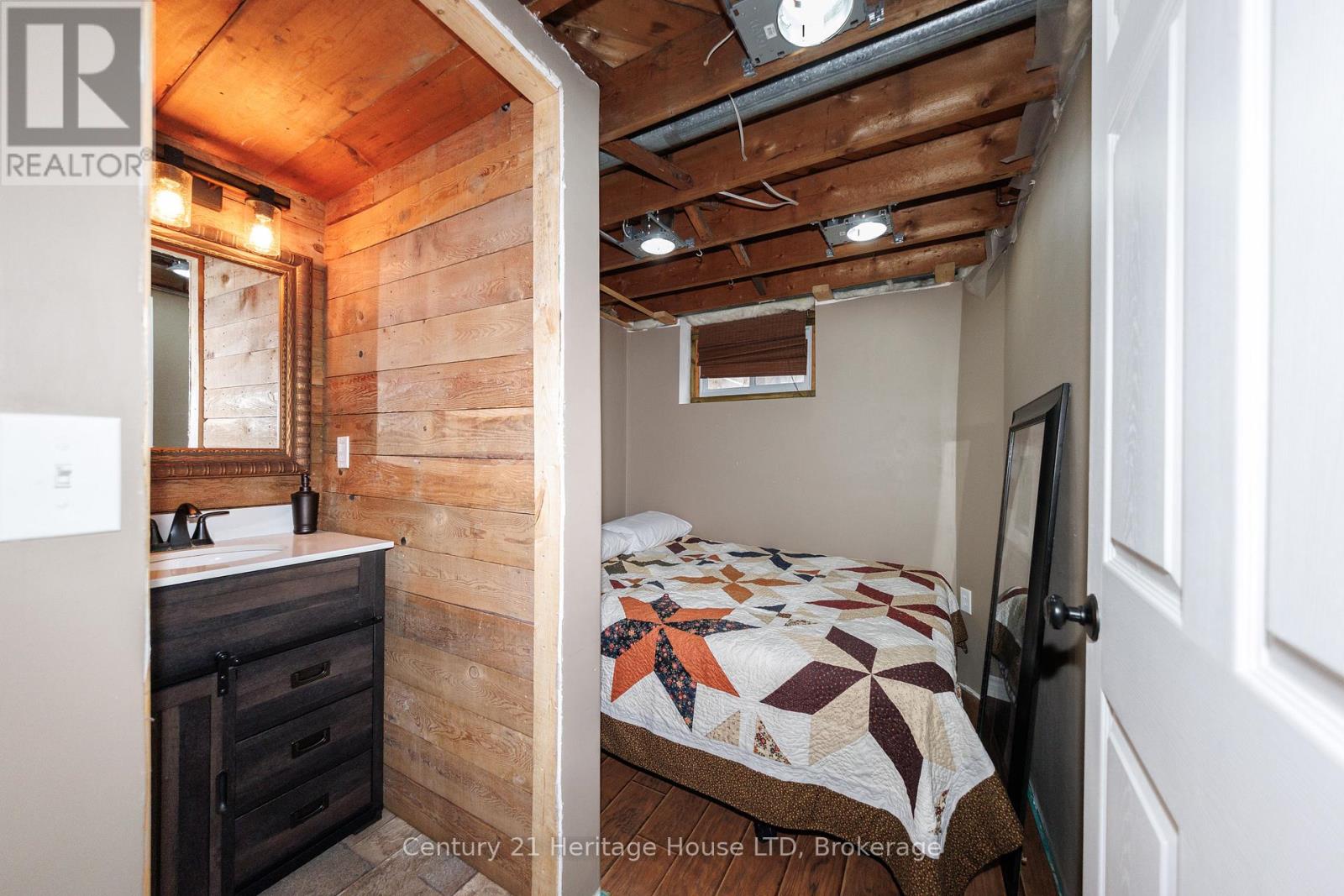 Basement bedroom + 2 pc ensuite bath