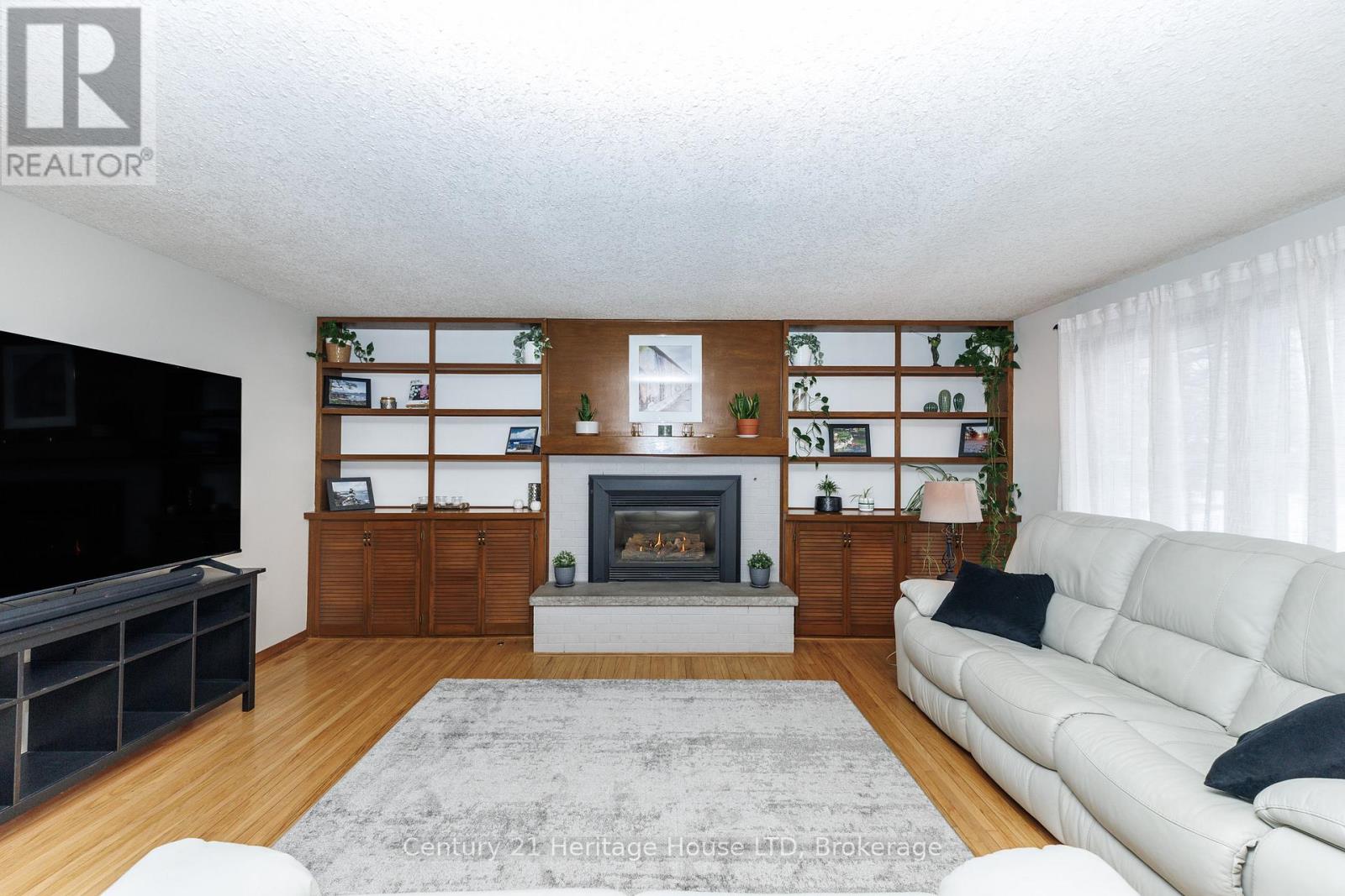 Built ins and gas fireplace