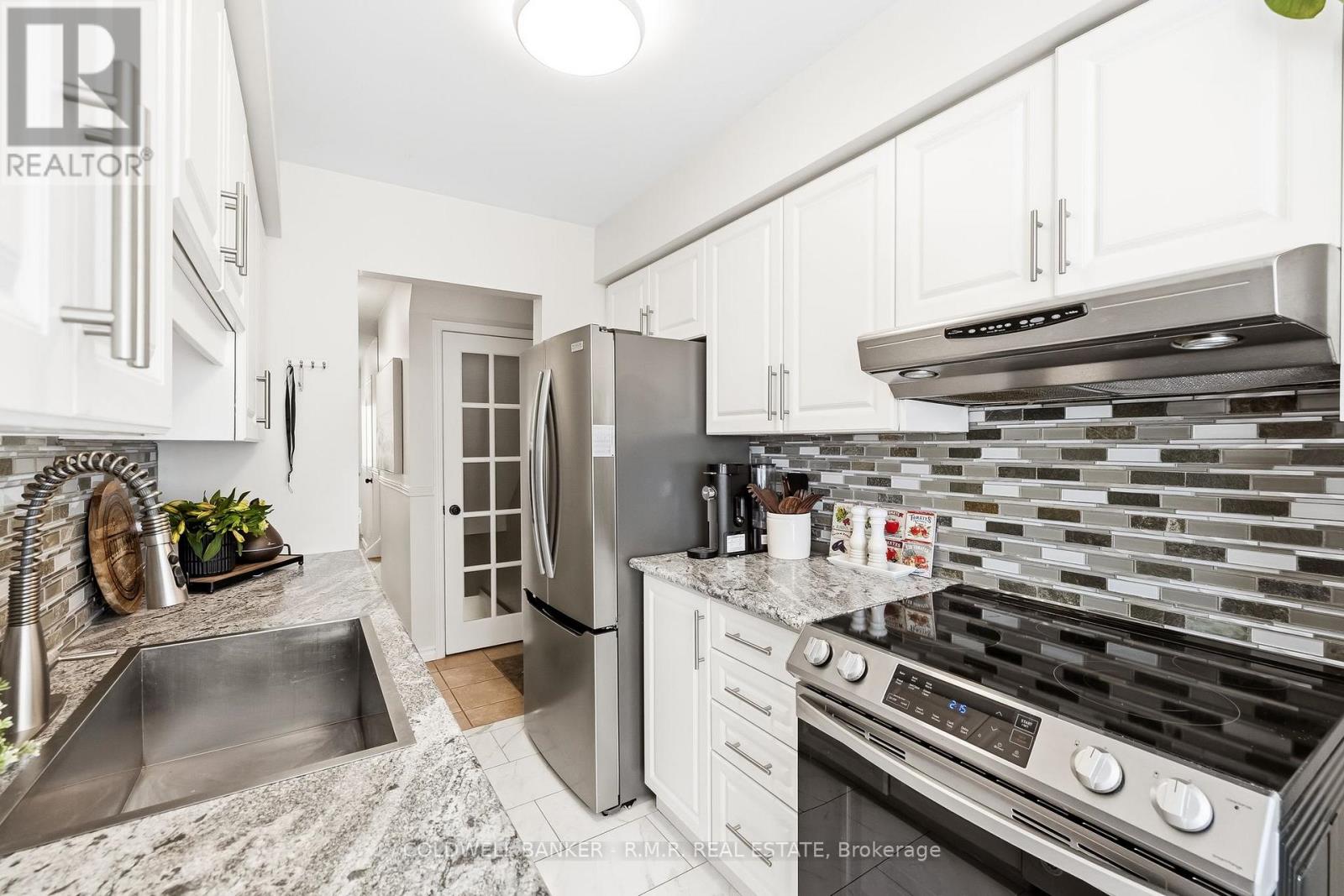 #12 811 WILSON ROAD N - 19