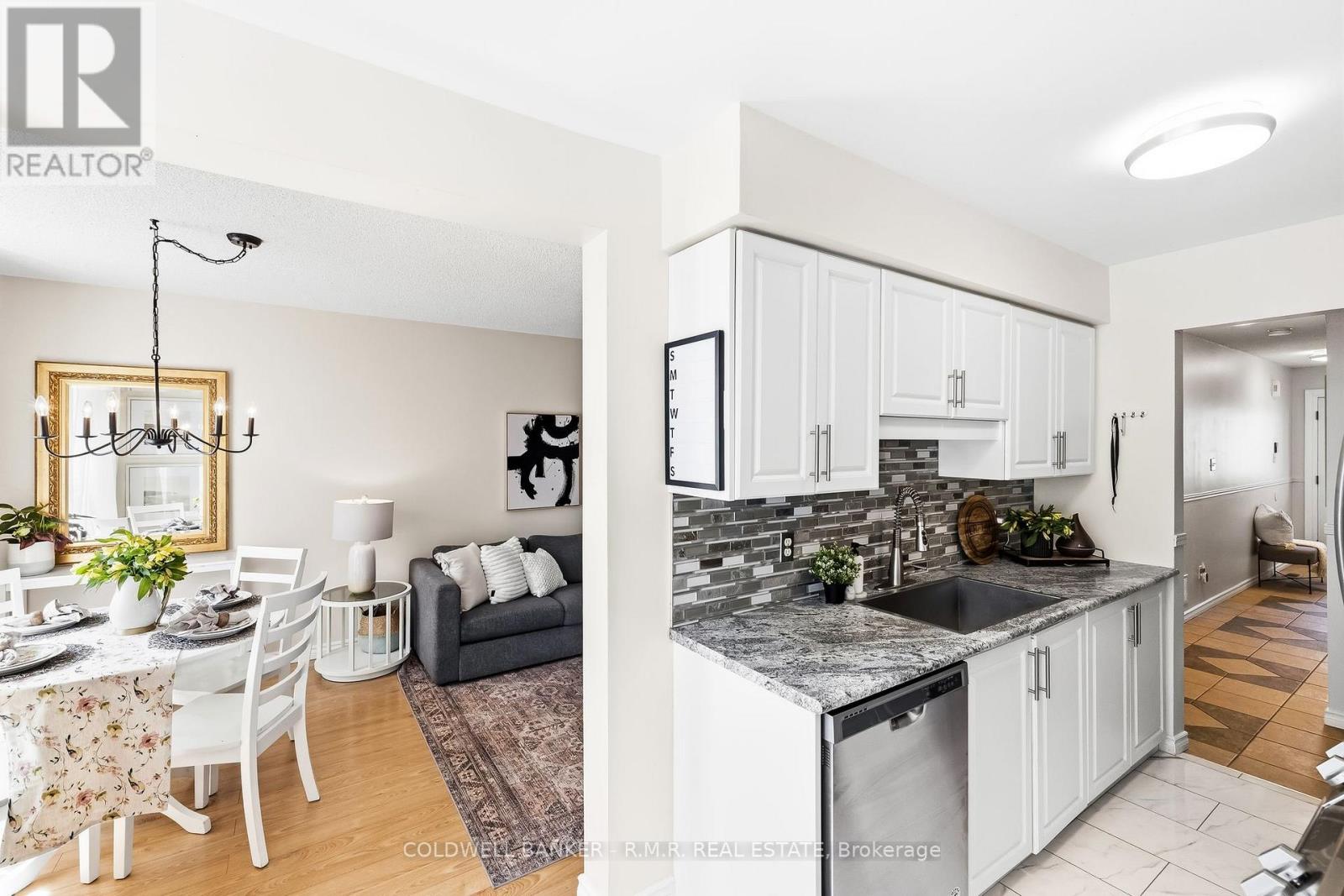 #12 811 WILSON ROAD N - 21