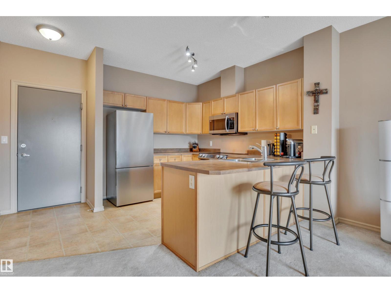 #211 226 MACEWAN RD SW - 16