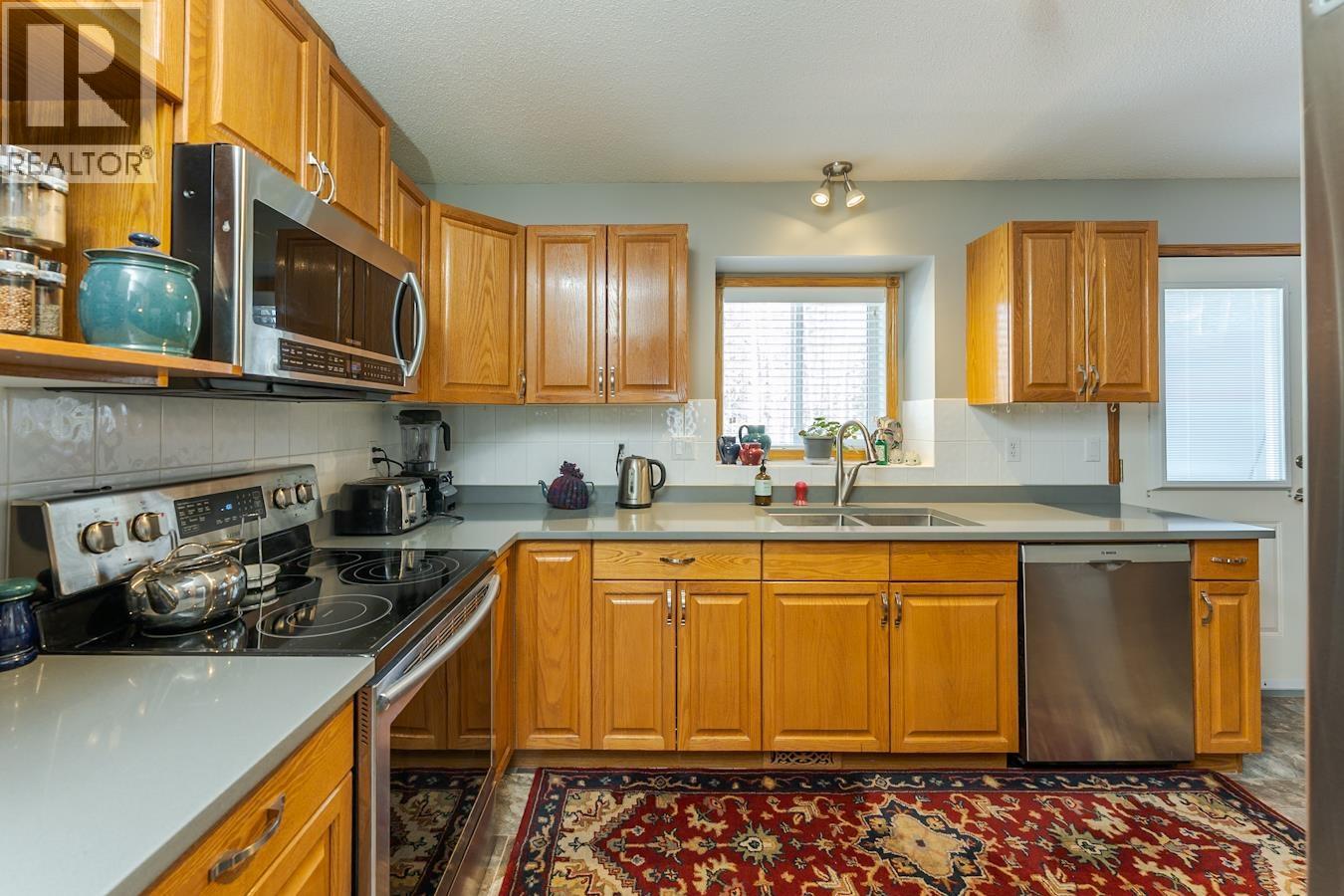 #104 6450 DAWSON ROAD - 3