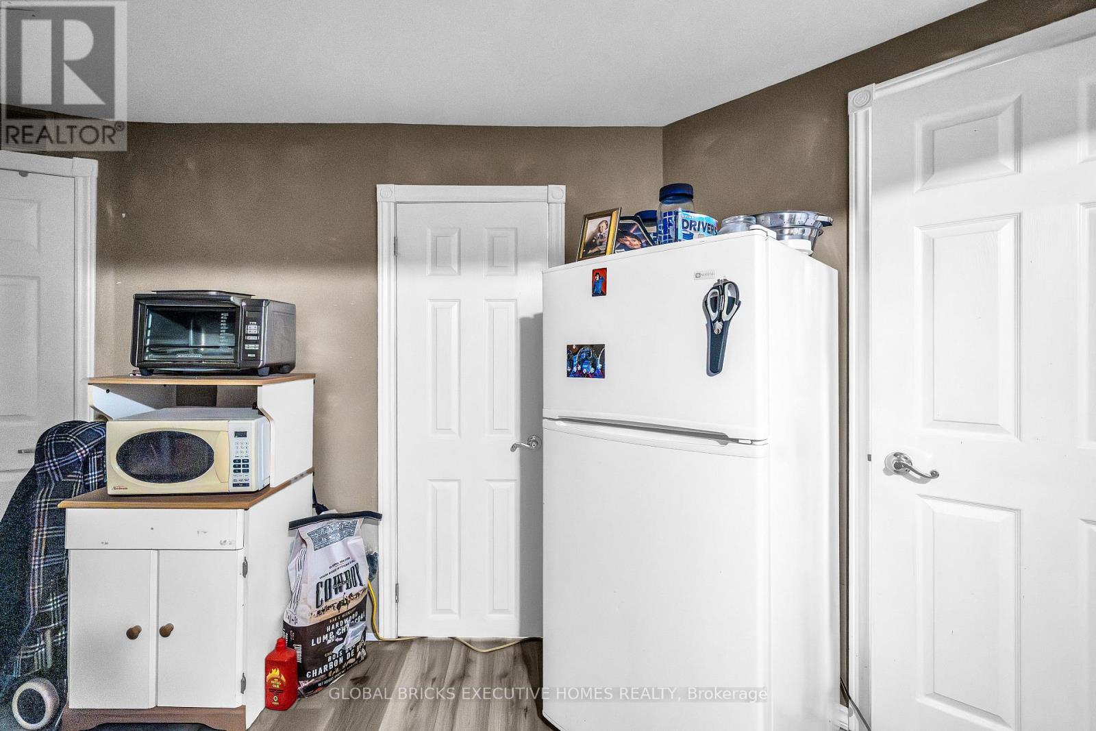 Basement kitchen with appliances
