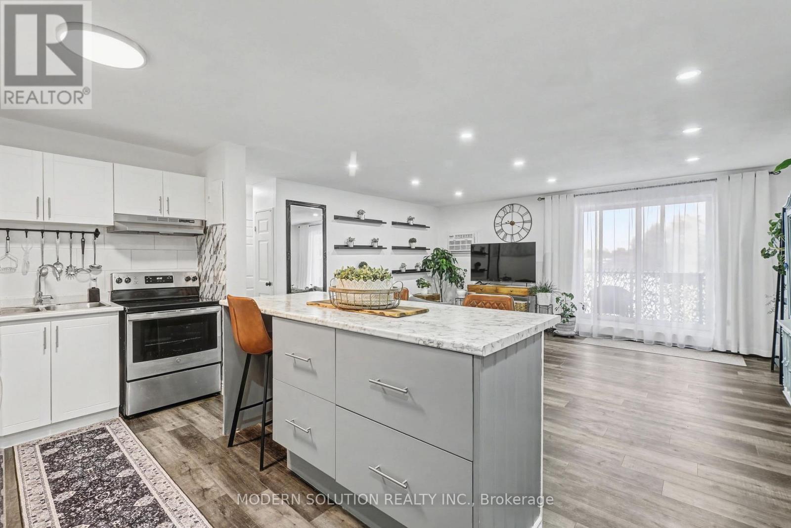 #308 563 MORNINGTON AVENUE - 1