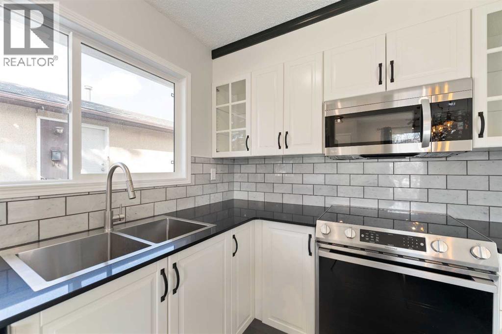 Single Family House 3 Level for Sale in  Rundlehorn Drive NE Pineridge Calgary 