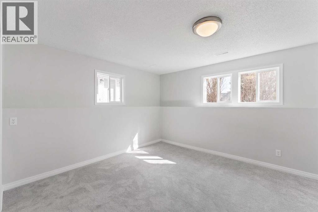 Single Family House 3 Level for Sale in  Rundlehorn Drive NE Pineridge Calgary 