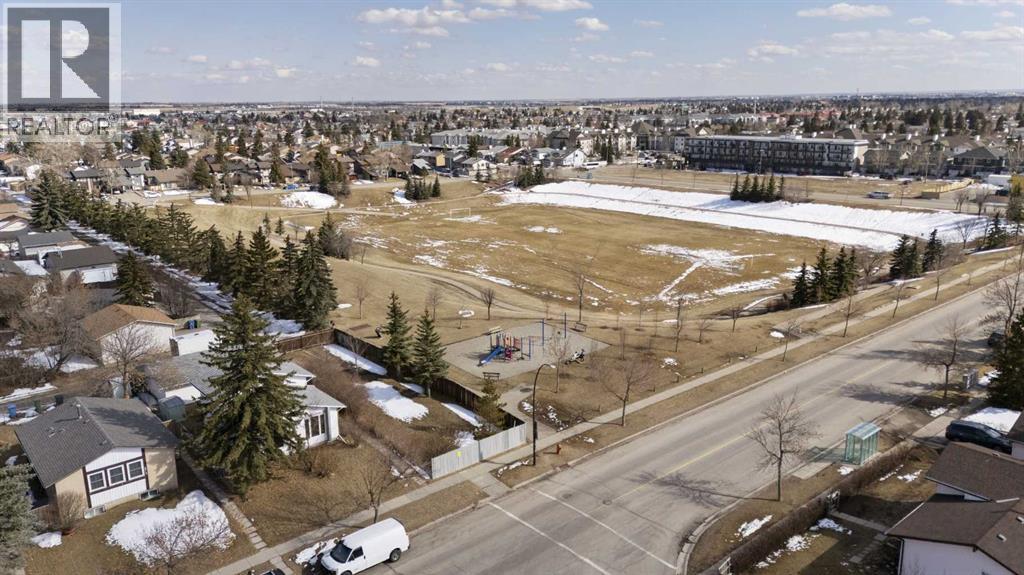 Single Family House 3 Level for Sale in  Rundlehorn Drive NE Pineridge Calgary 