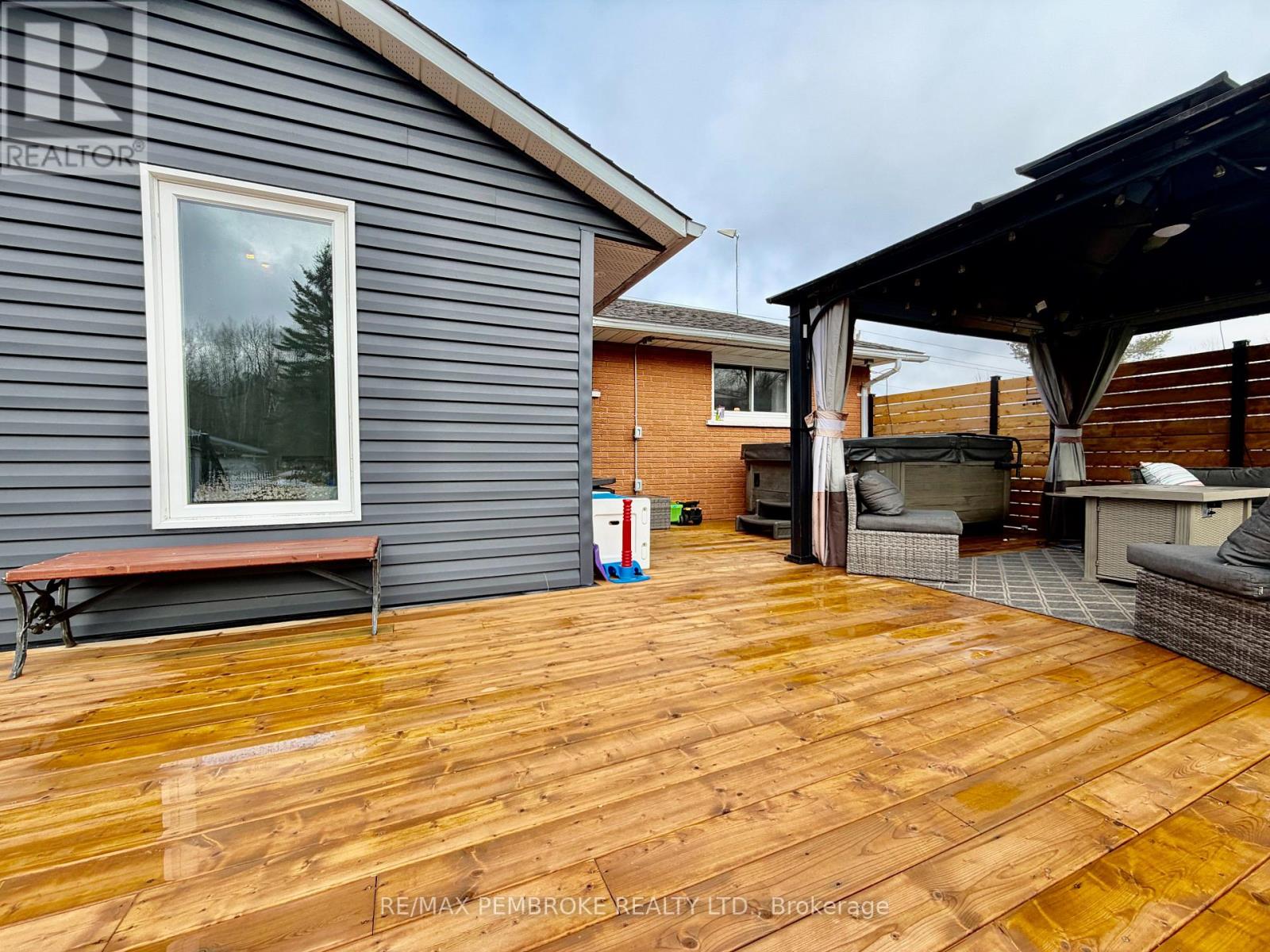 New Deck ( Hot tub to be removed prior to closing)