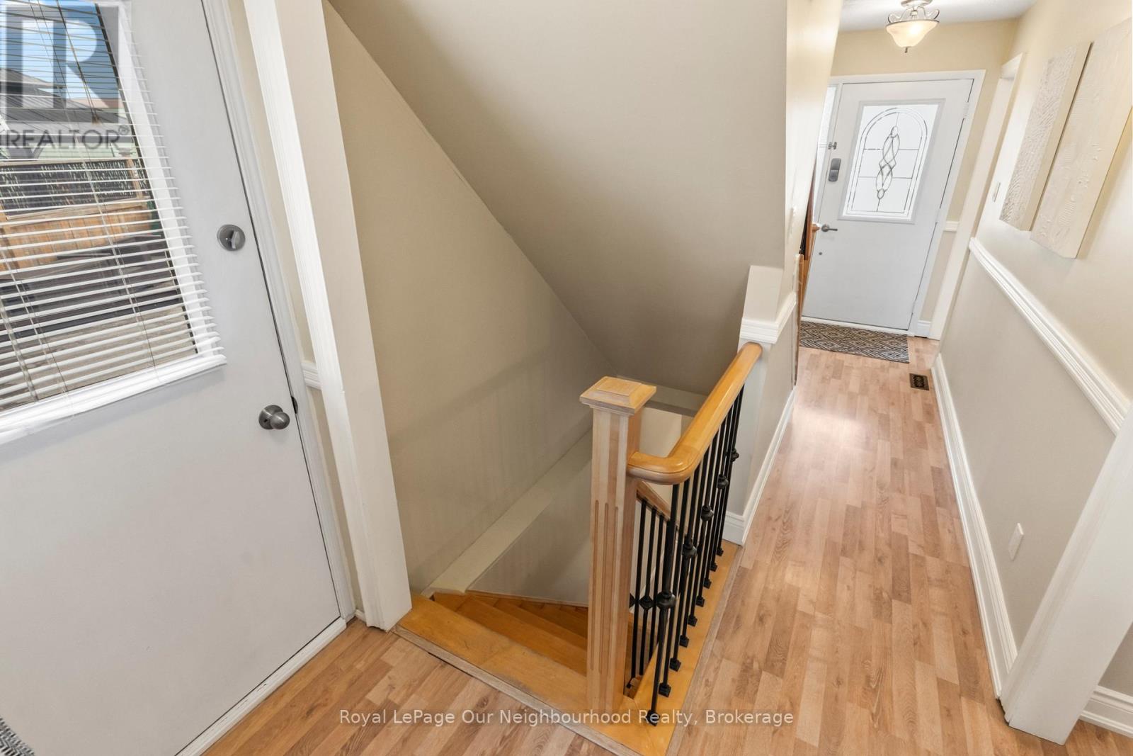 Side door leading to finished basement.